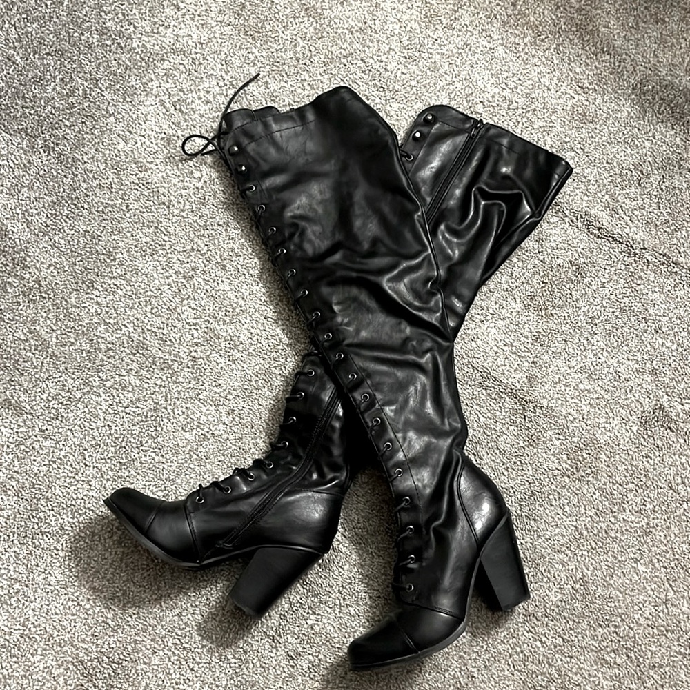 Thigh high lace up black boots